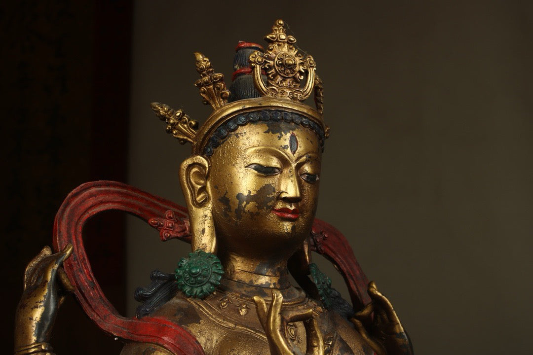Handcrafted copper gilded Guanyin statue with four arms