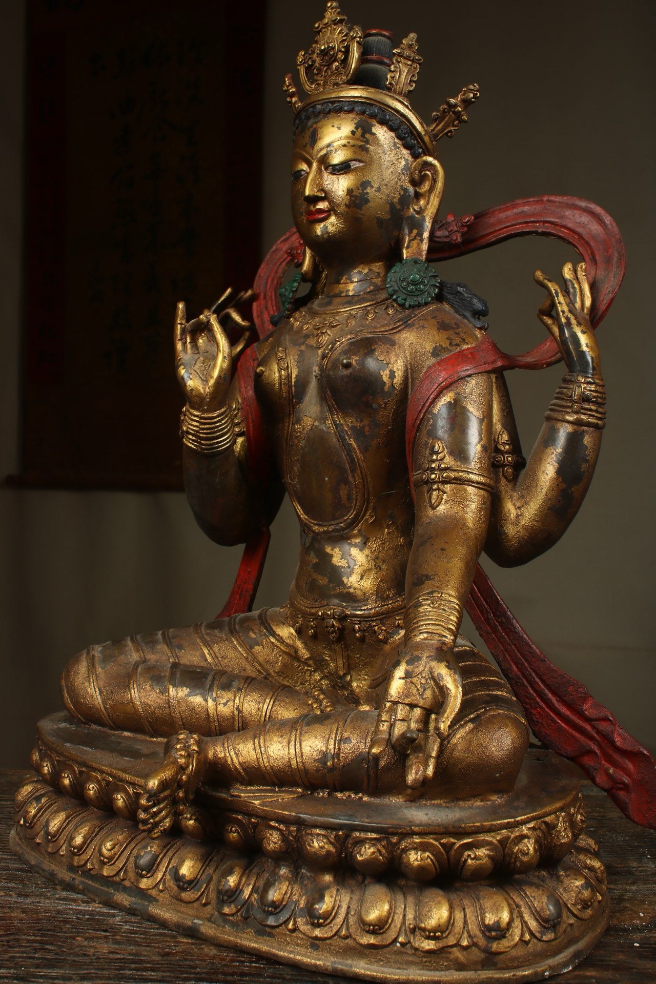 Handcrafted copper gilded Guanyin statue with four arms