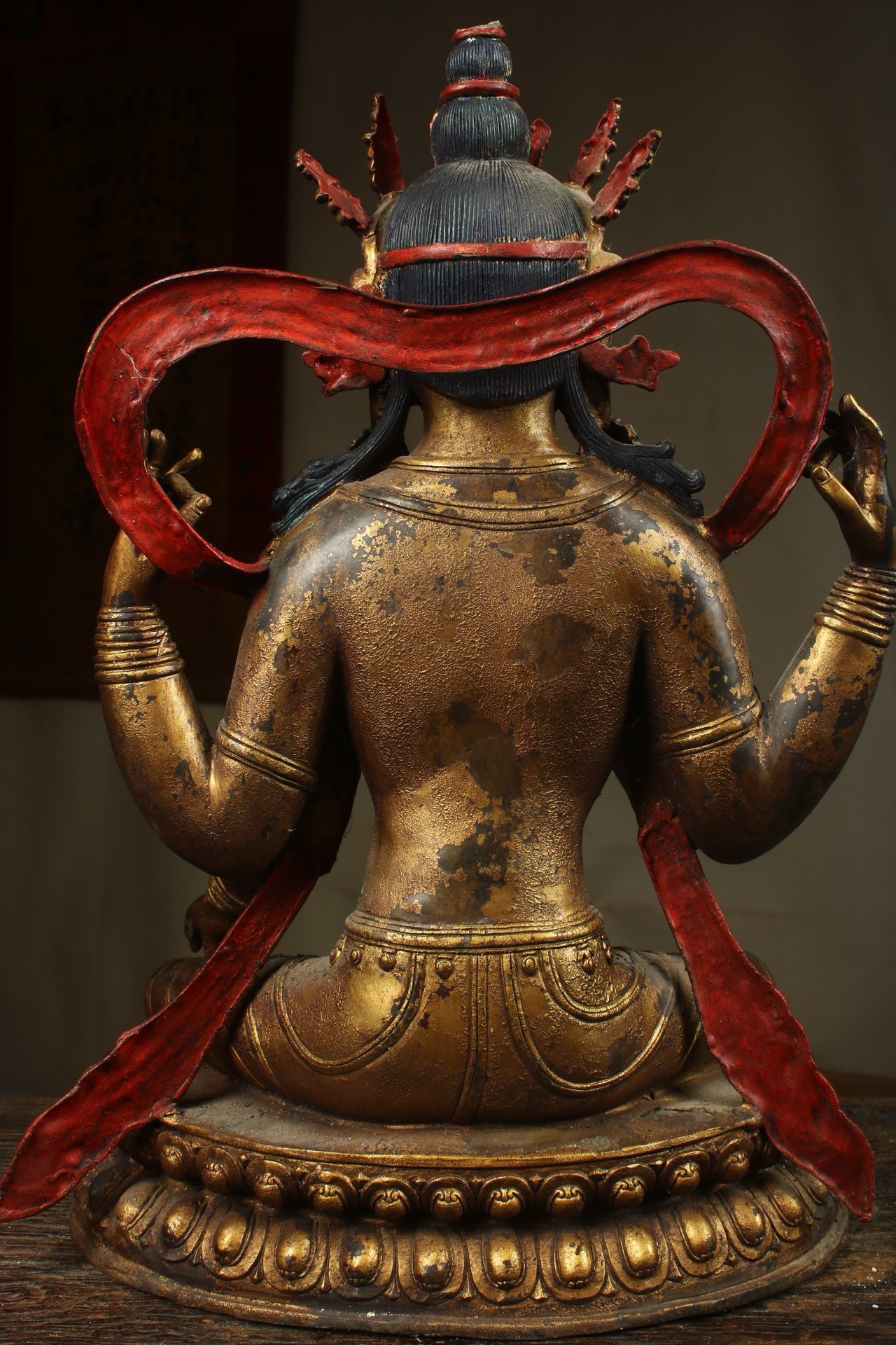 Handcrafted copper gilded Guanyin statue with four arms