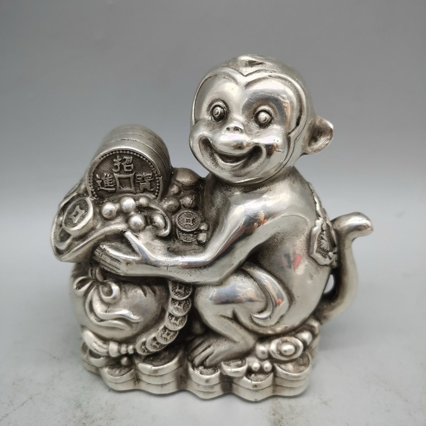 White copper monkey ornament