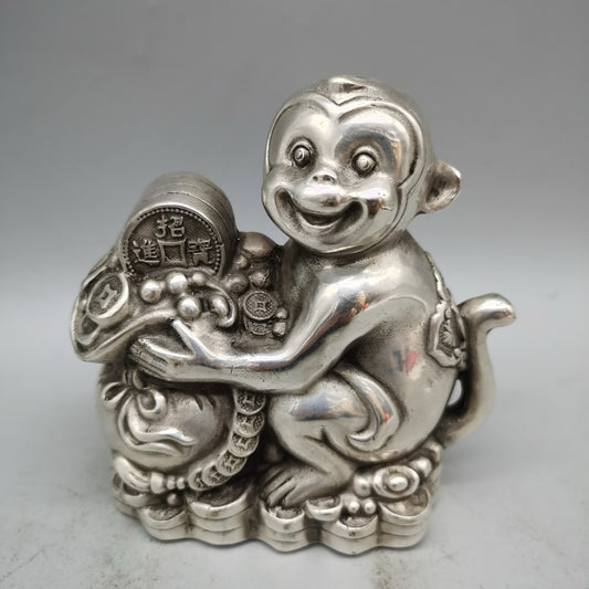 White copper monkey ornament