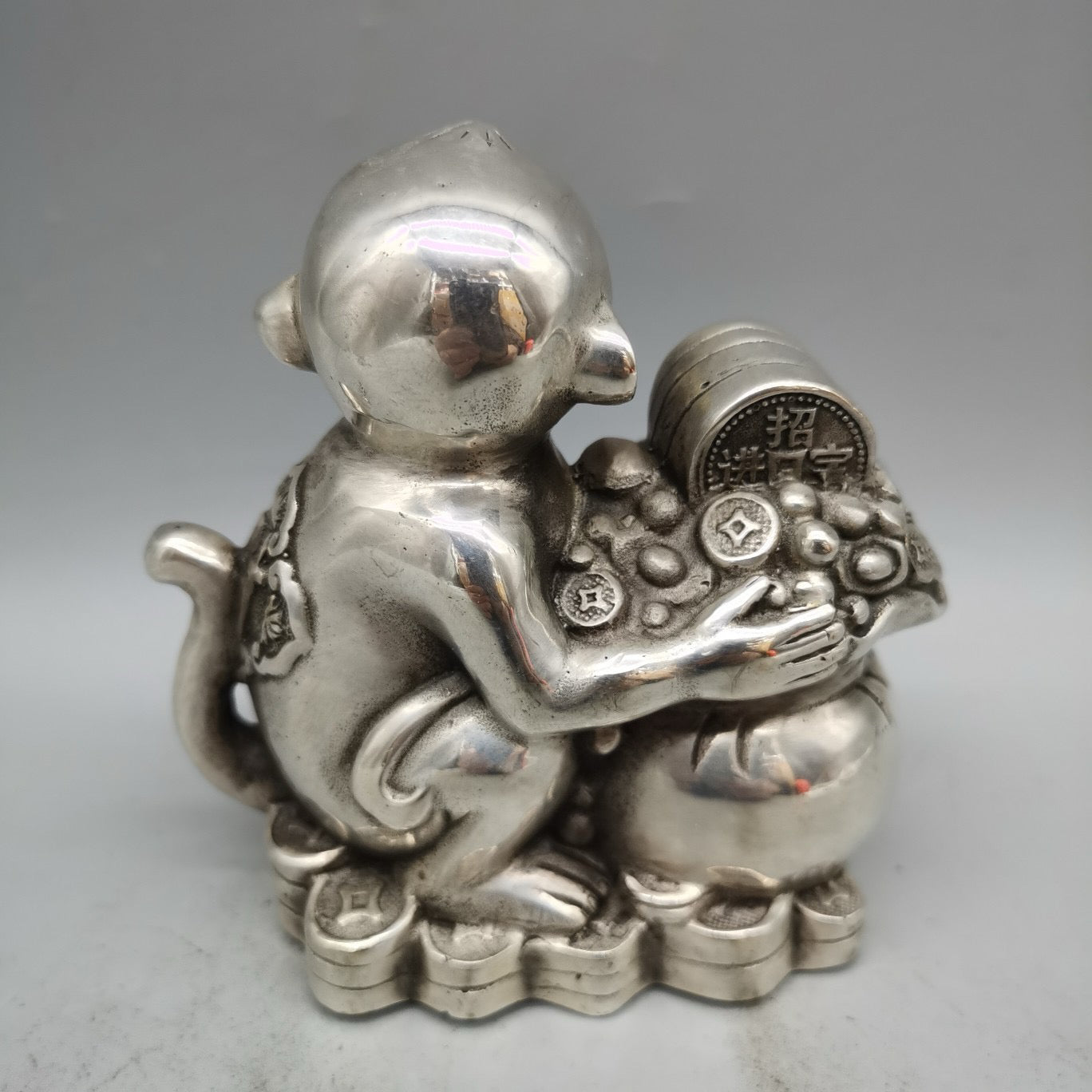 White copper monkey ornament