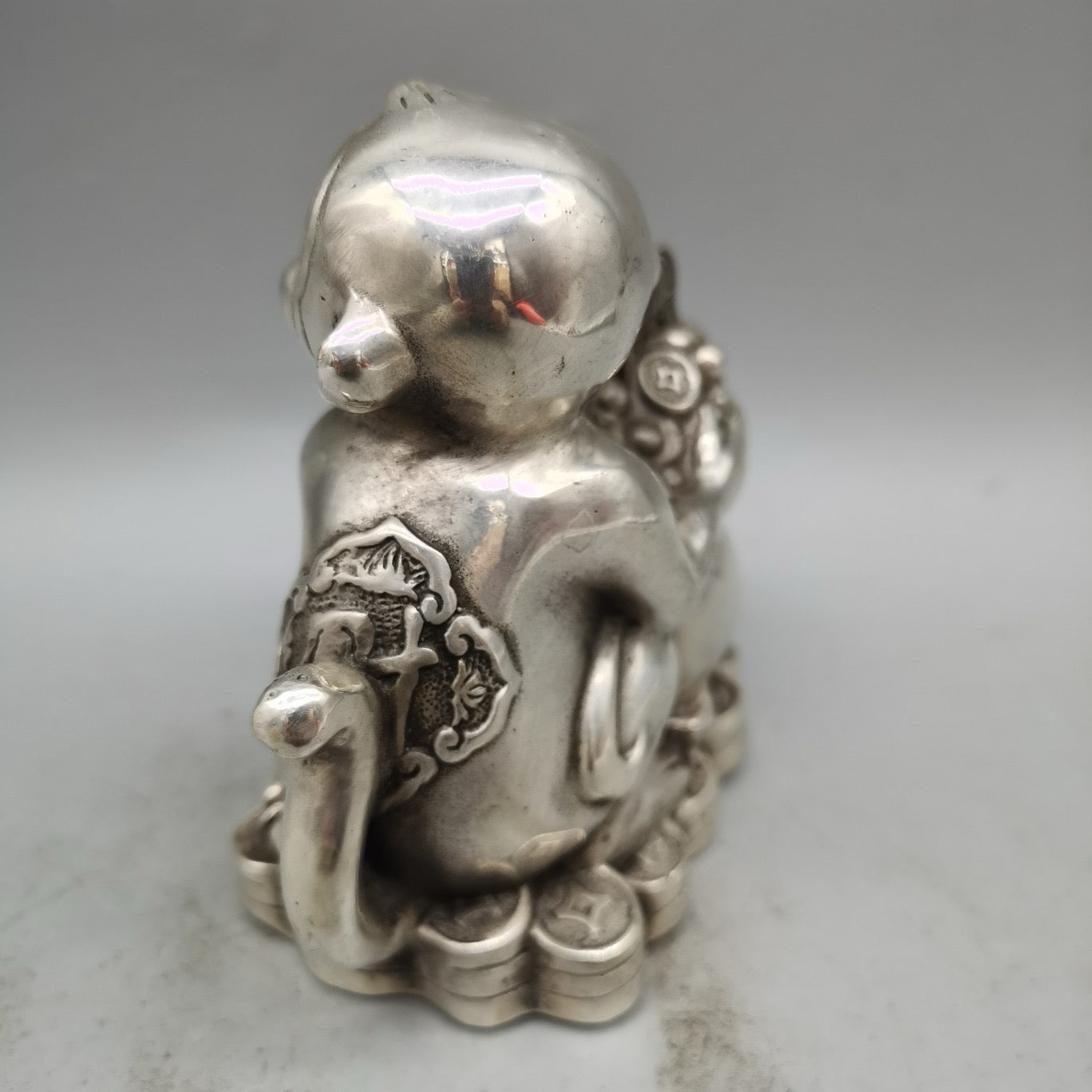 White copper monkey ornament