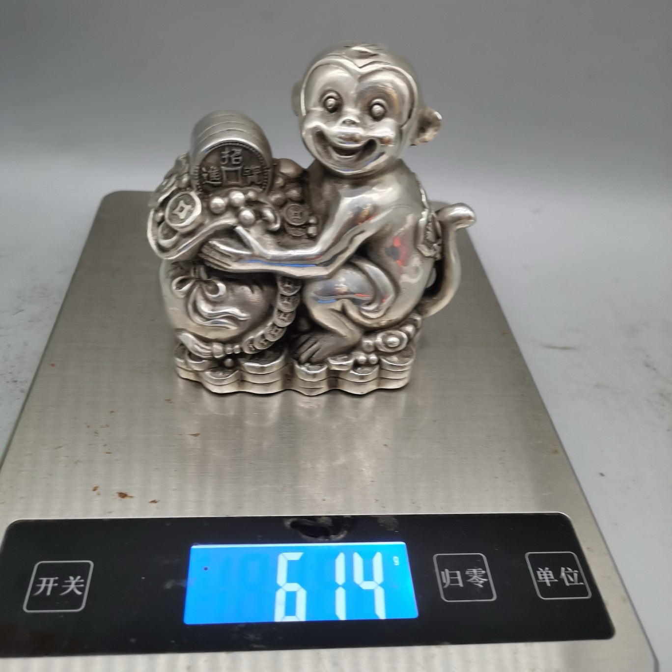 White copper monkey ornament