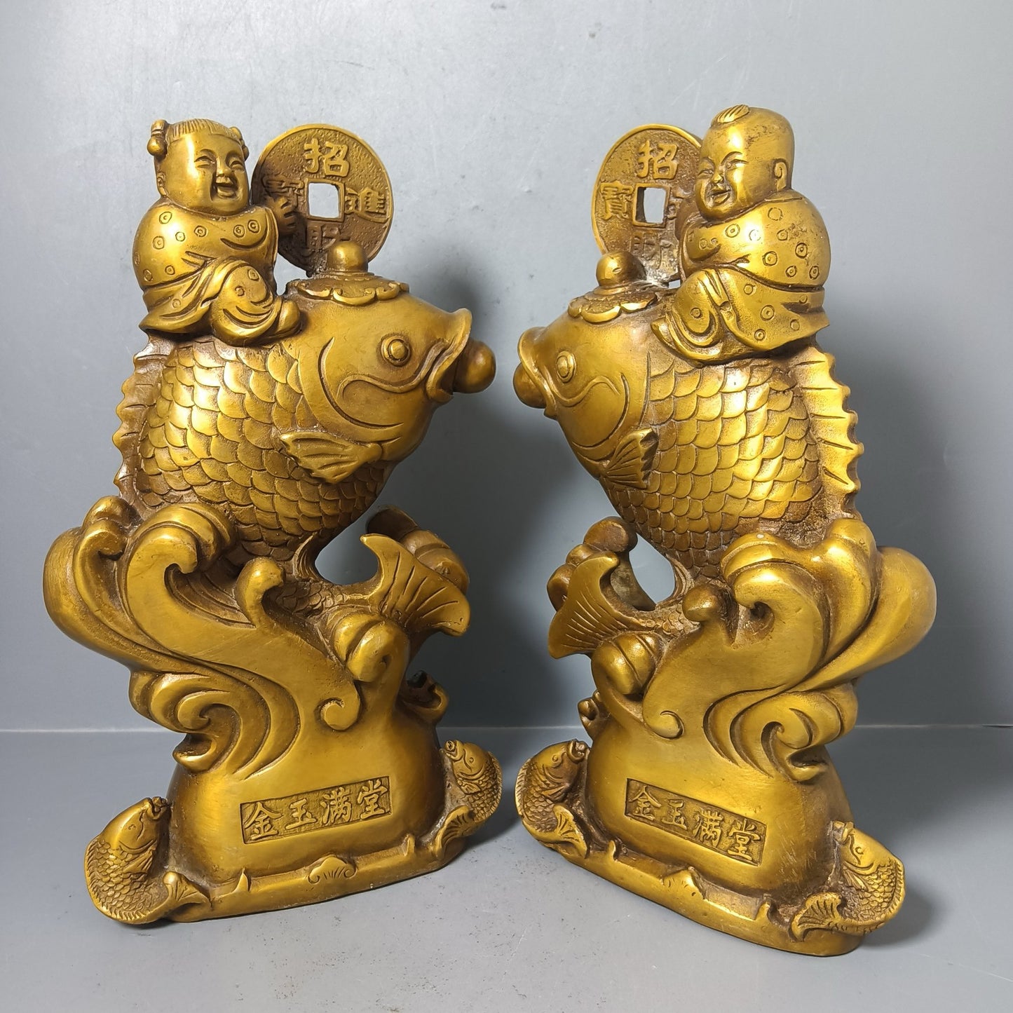 A pair of Chinese antique pure copper goldfish ornaments for attracting wealth