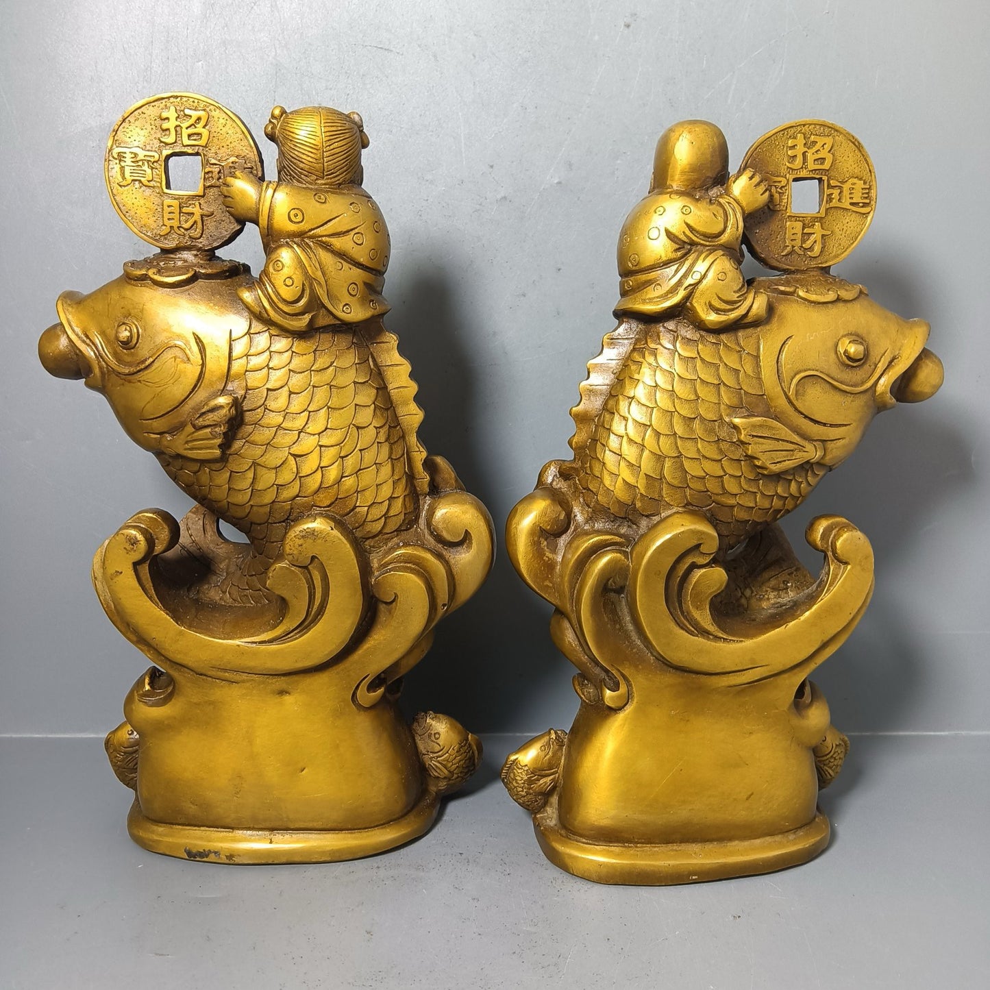 A pair of Chinese antique pure copper goldfish ornaments for attracting wealth