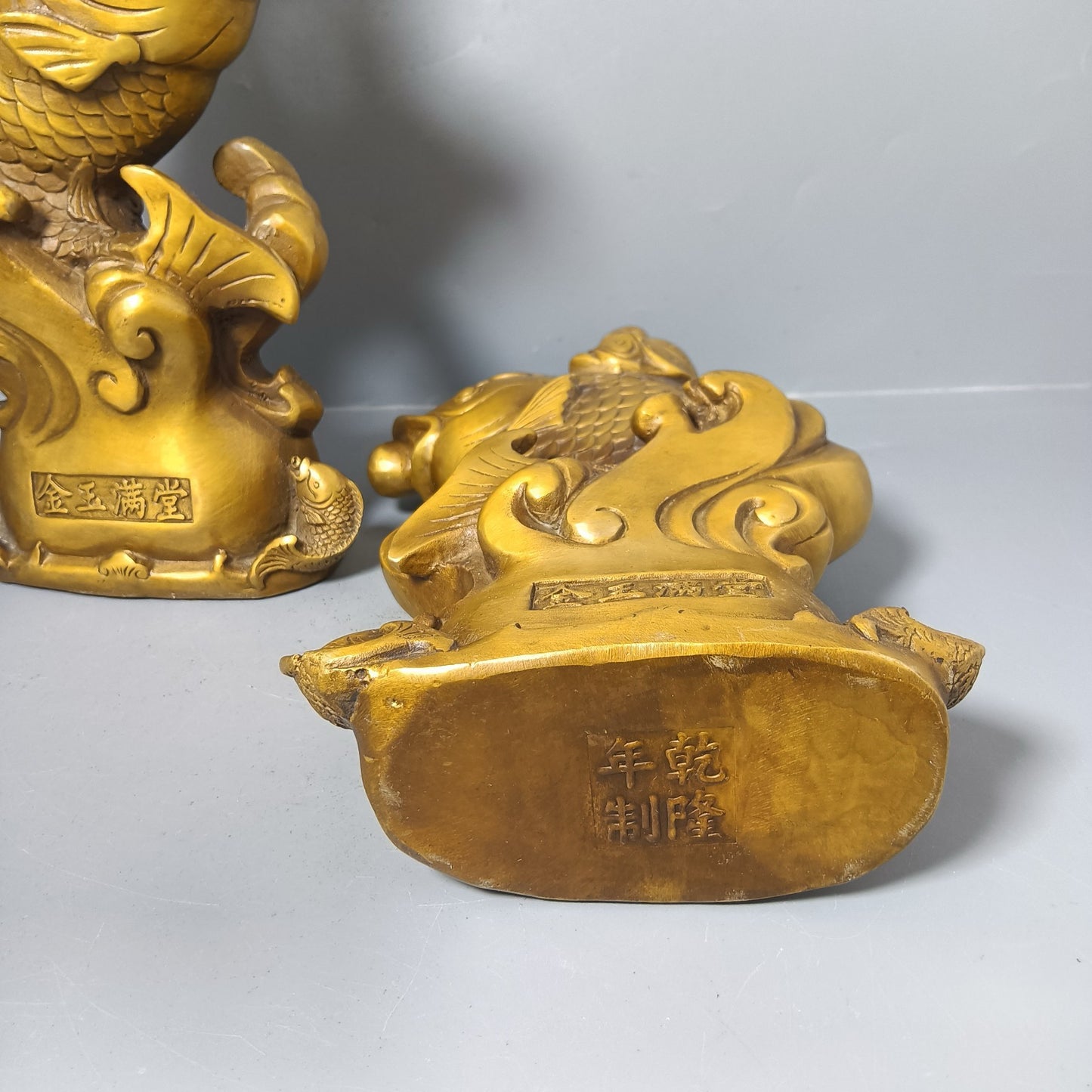 A pair of Chinese antique pure copper goldfish ornaments for attracting wealth