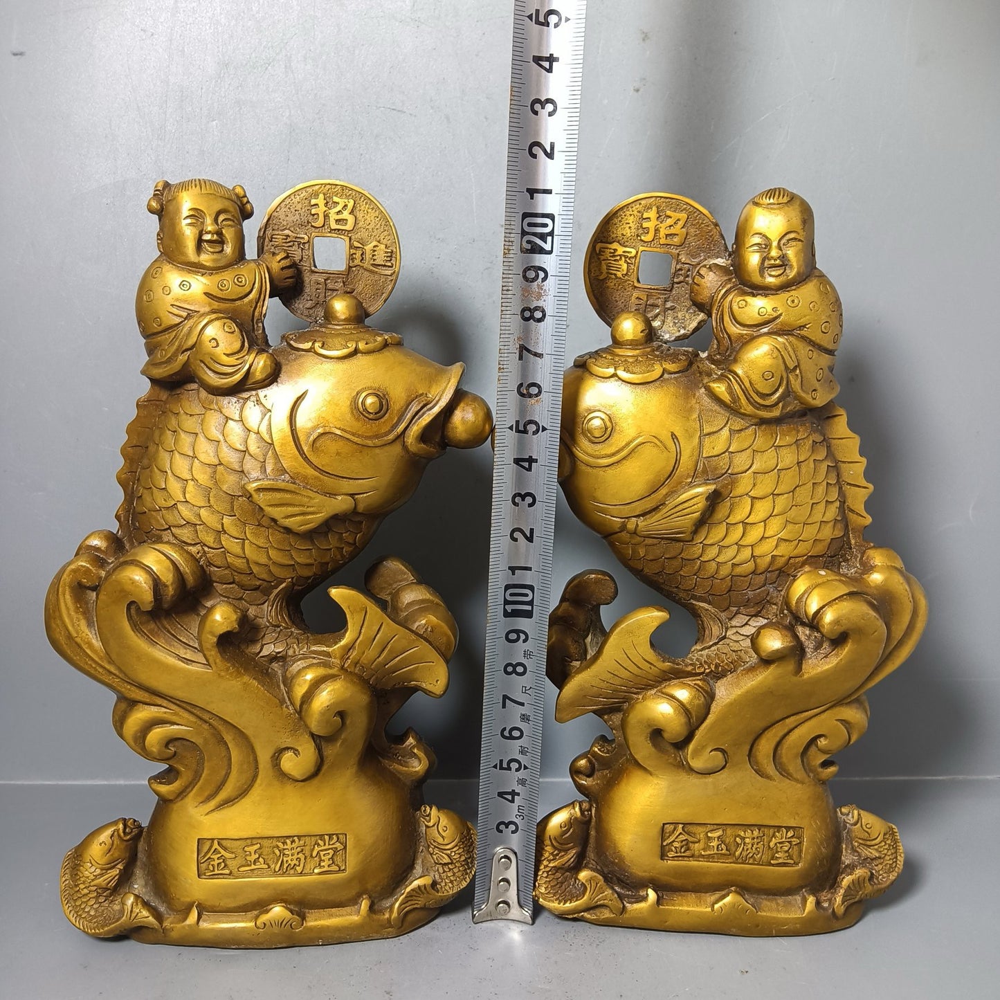 A pair of Chinese antique pure copper goldfish ornaments for attracting wealth