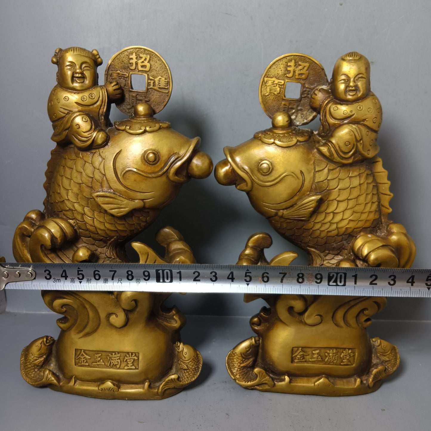 A pair of Chinese antique pure copper goldfish ornaments for attracting wealth