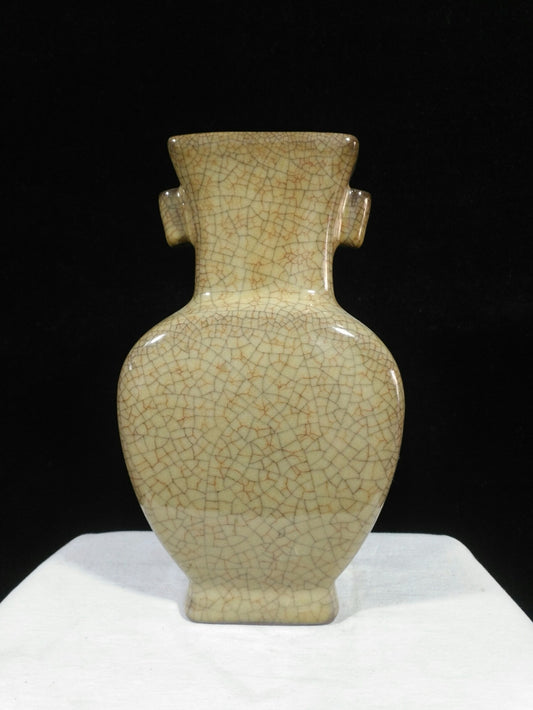Ceramic yellow glazed wine vessel