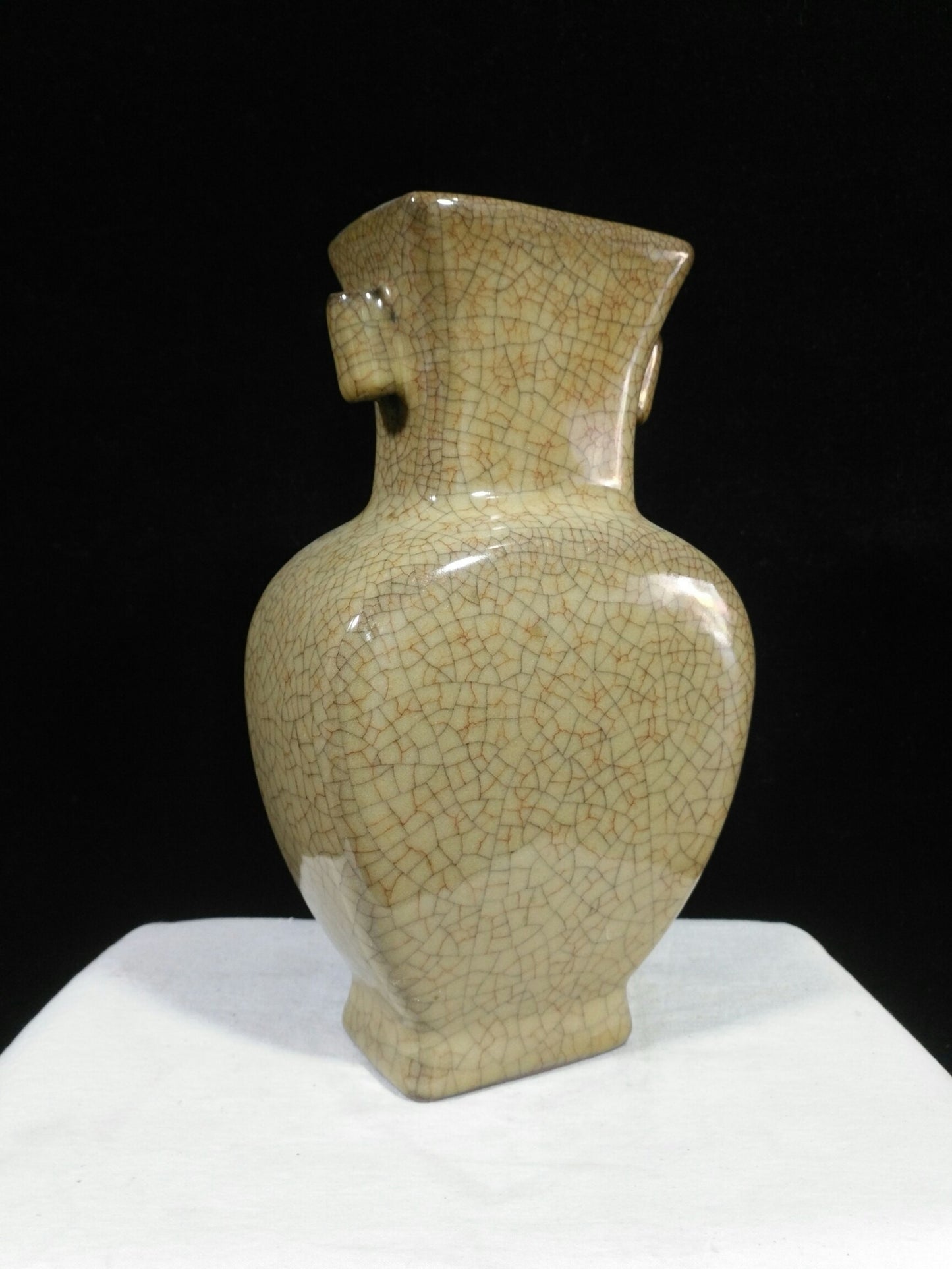 Ceramic yellow glazed wine vessel