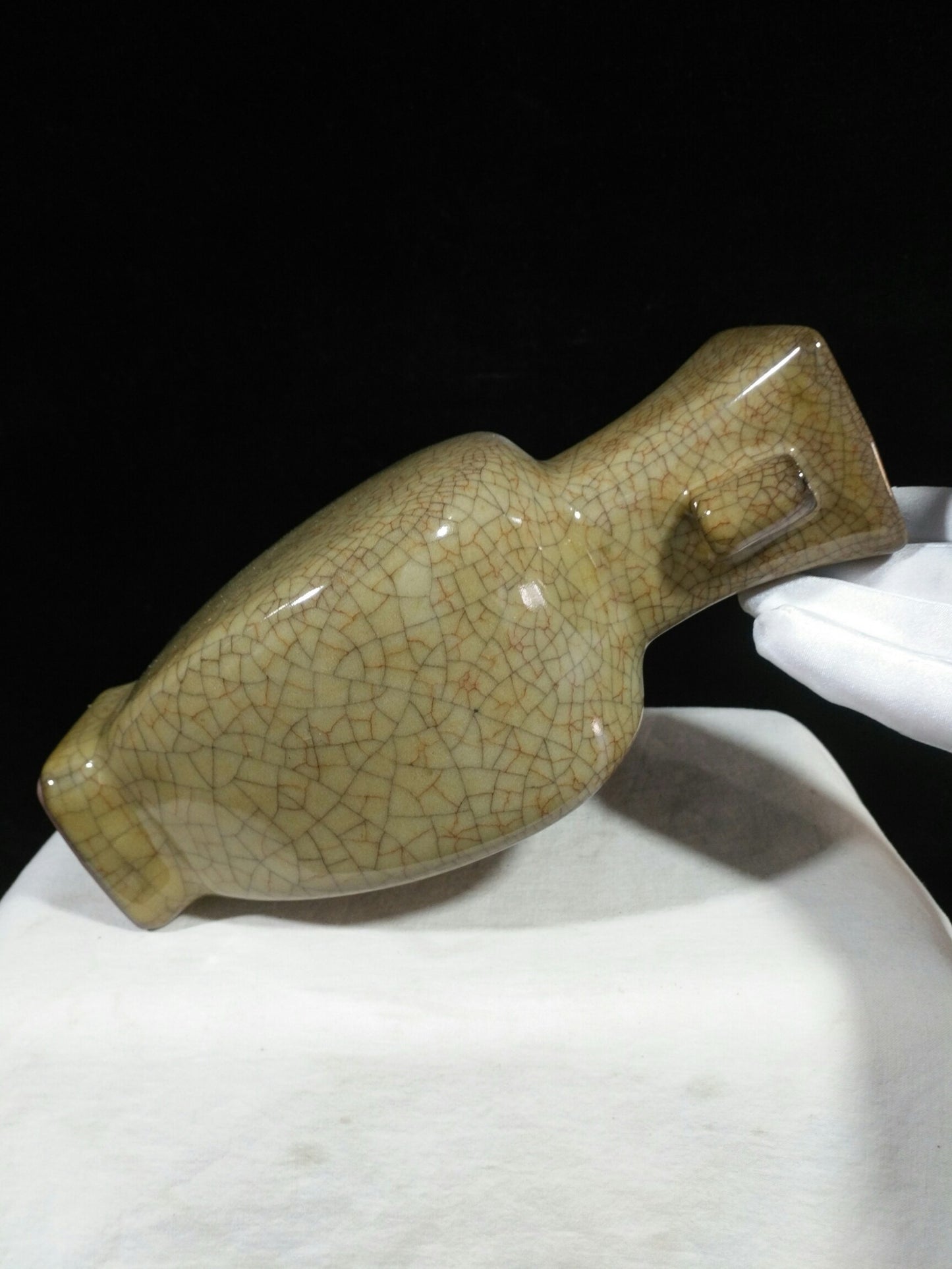 Ceramic yellow glazed wine vessel