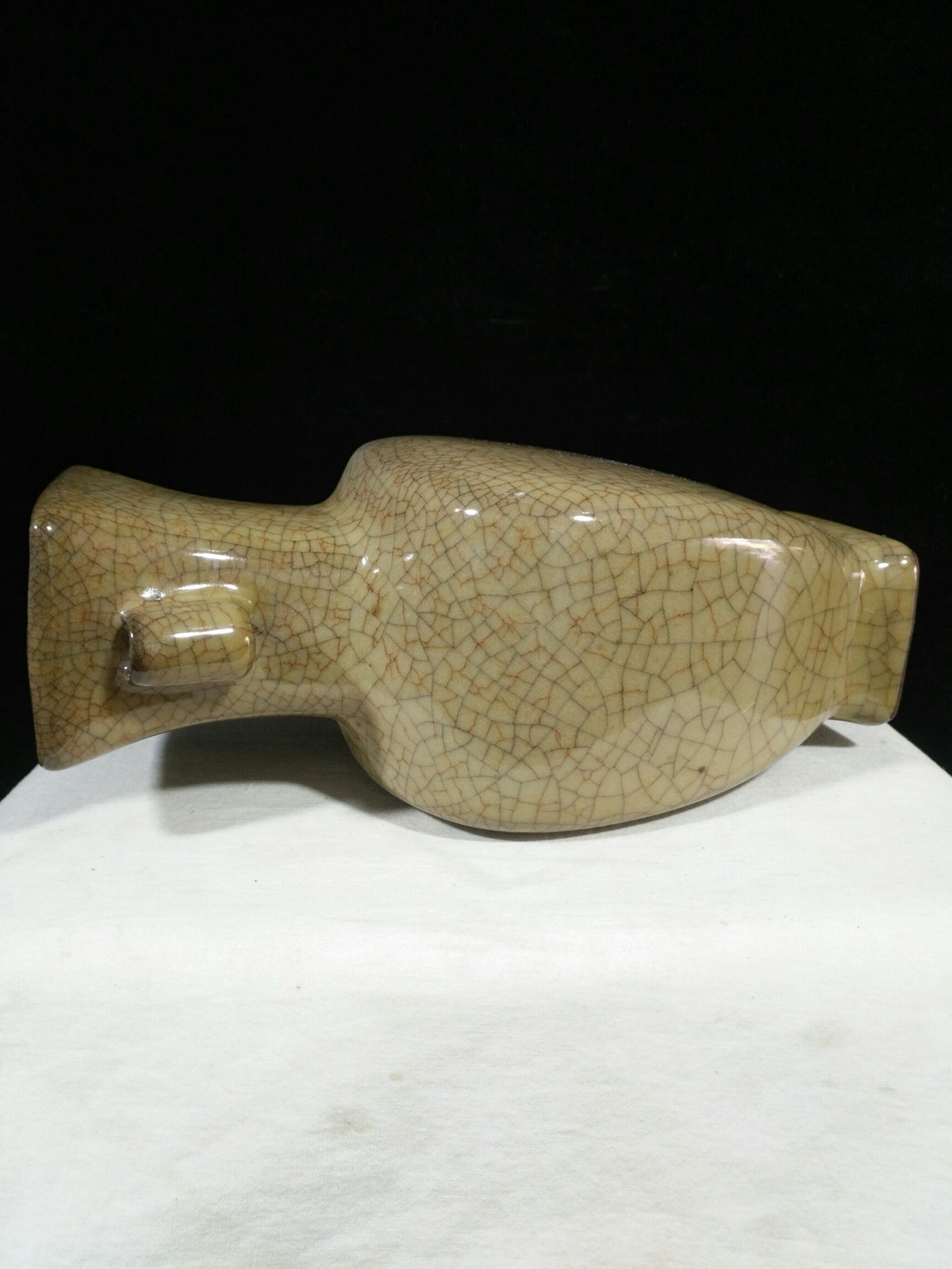 Ceramic yellow glazed wine vessel