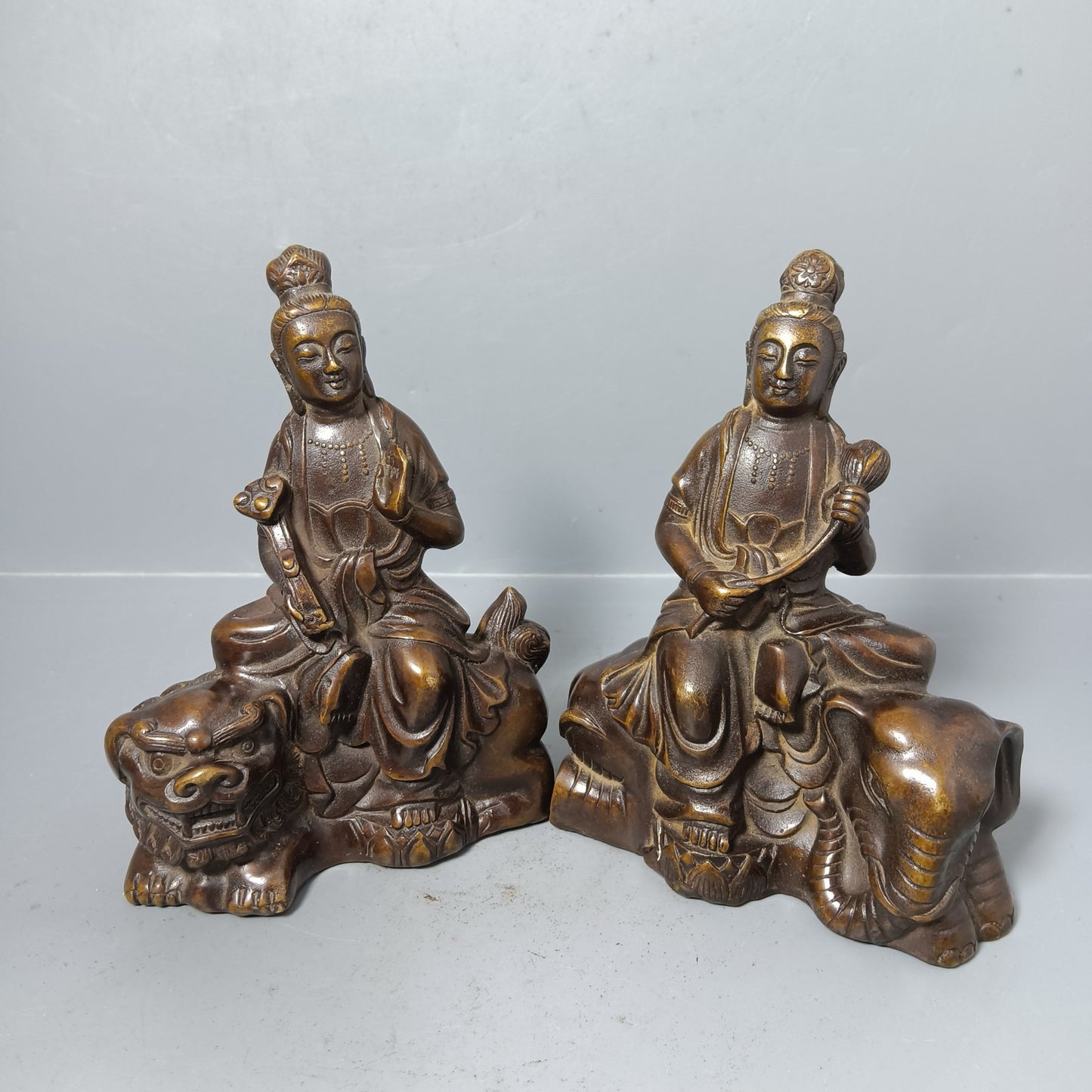 A pair of Chinese antique pure copper Manjushri universal sages