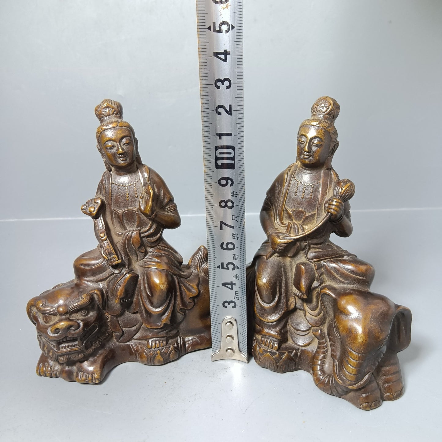 A pair of Chinese antique pure copper Manjushri universal sages