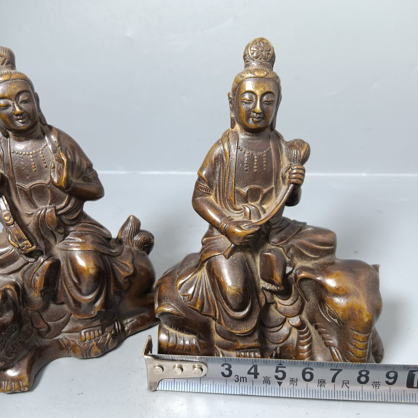 A pair of Chinese antique pure copper Manjushri universal sages