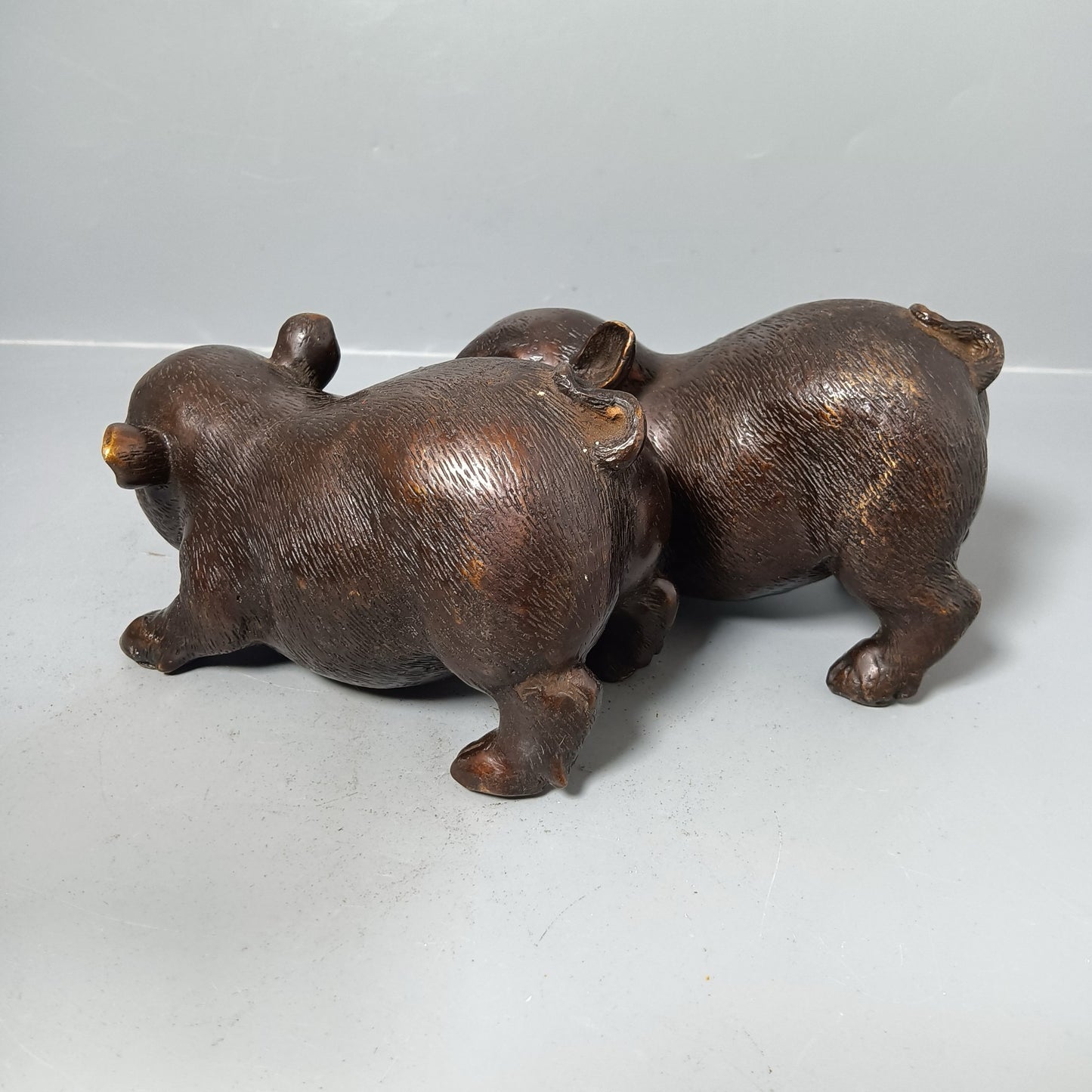 A pair of Chinese antique pure copper pigs