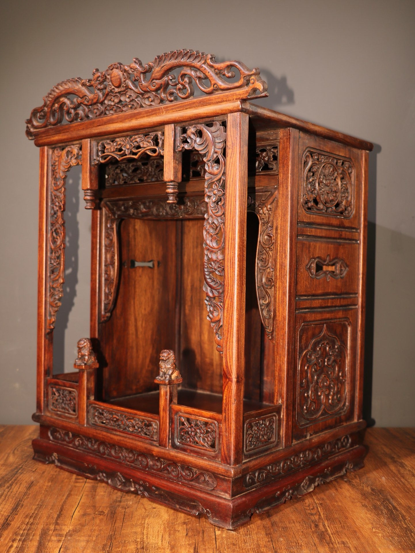 A Chinese antique rosewood Buddha niche