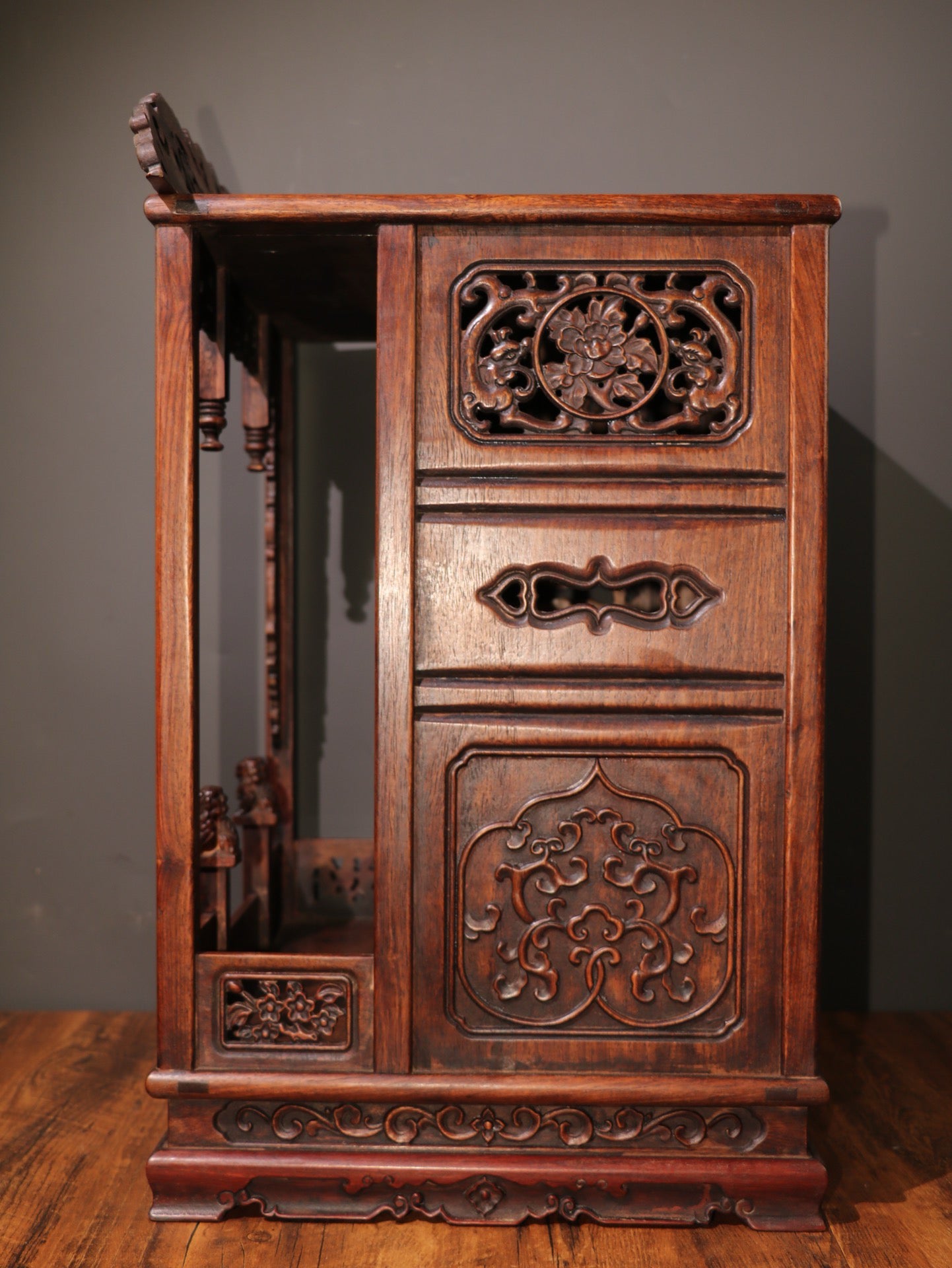 A Chinese antique rosewood Buddha niche