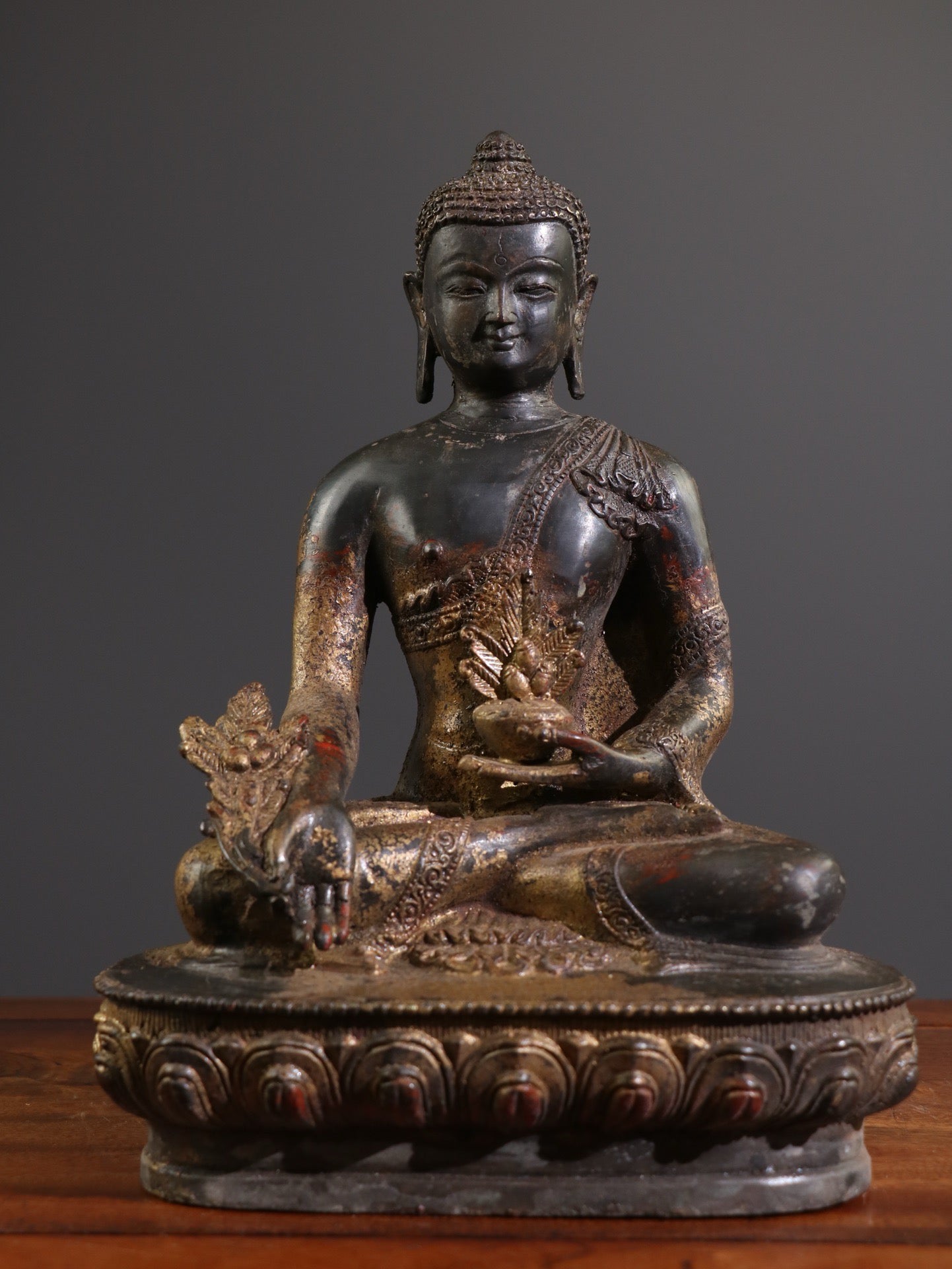 A Chinese antique statue of Shakyamuni Medicine Buddha