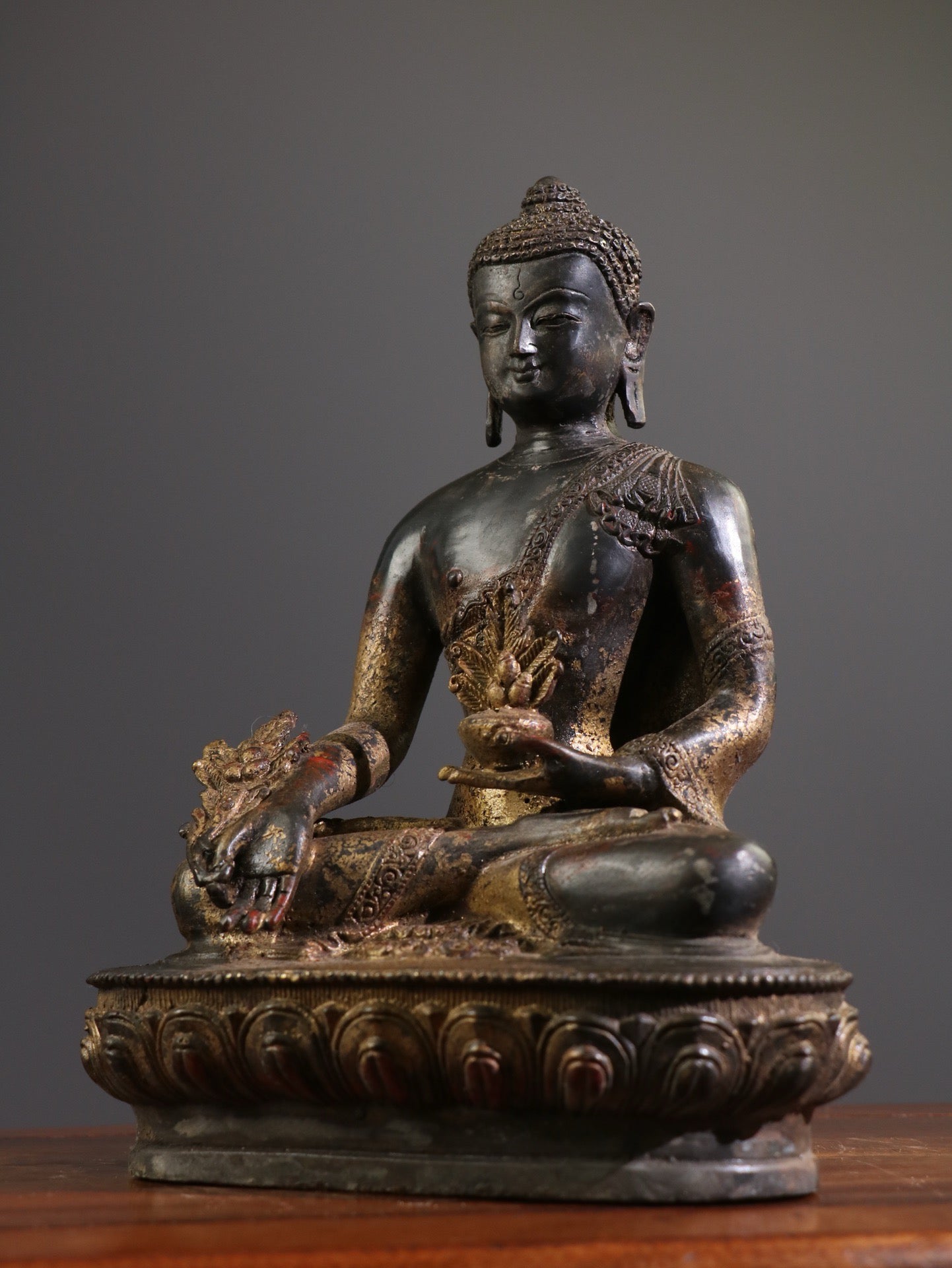 A Chinese antique statue of Shakyamuni Medicine Buddha