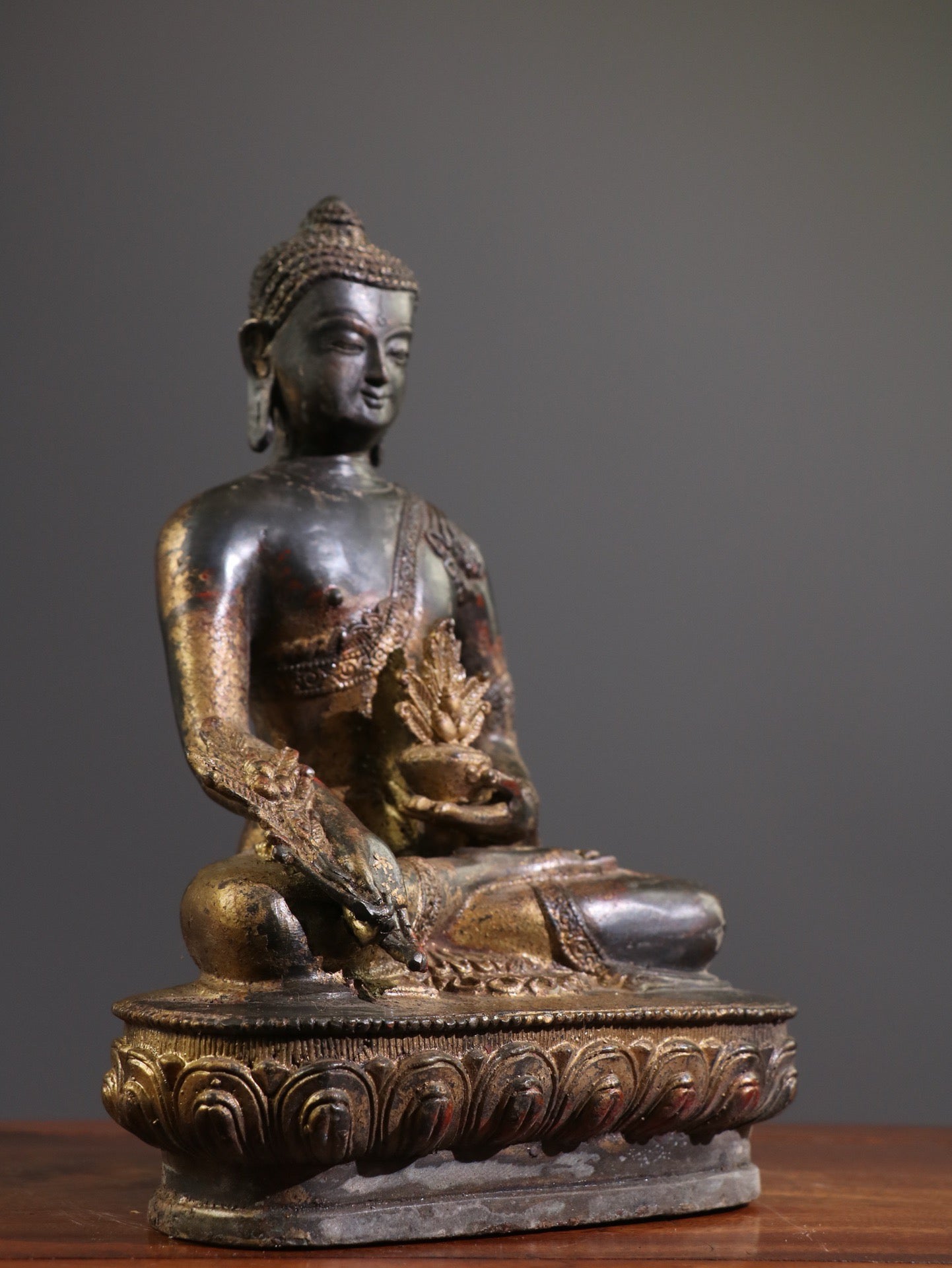 A Chinese antique statue of Shakyamuni Medicine Buddha