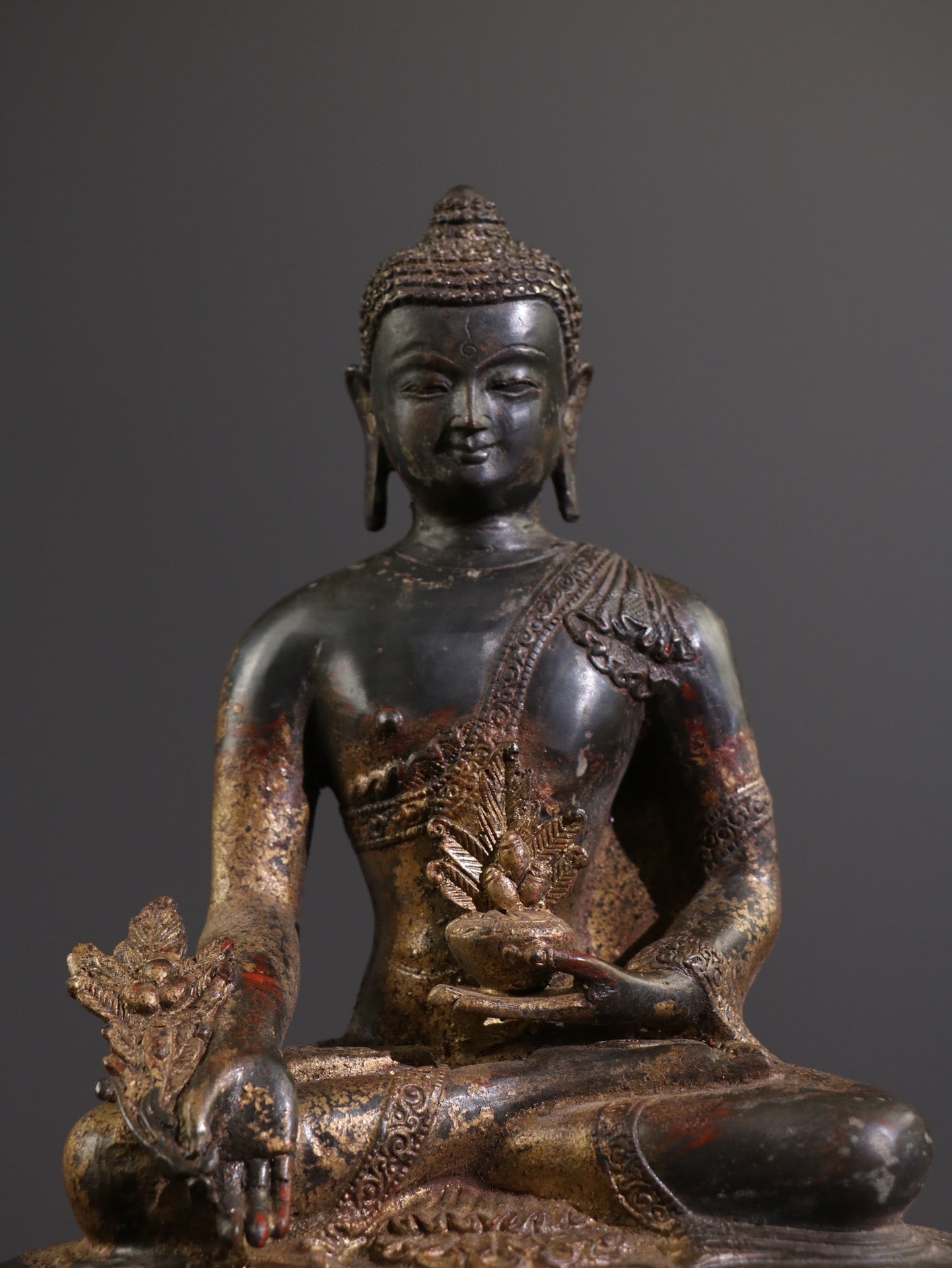 A Chinese antique statue of Shakyamuni Medicine Buddha