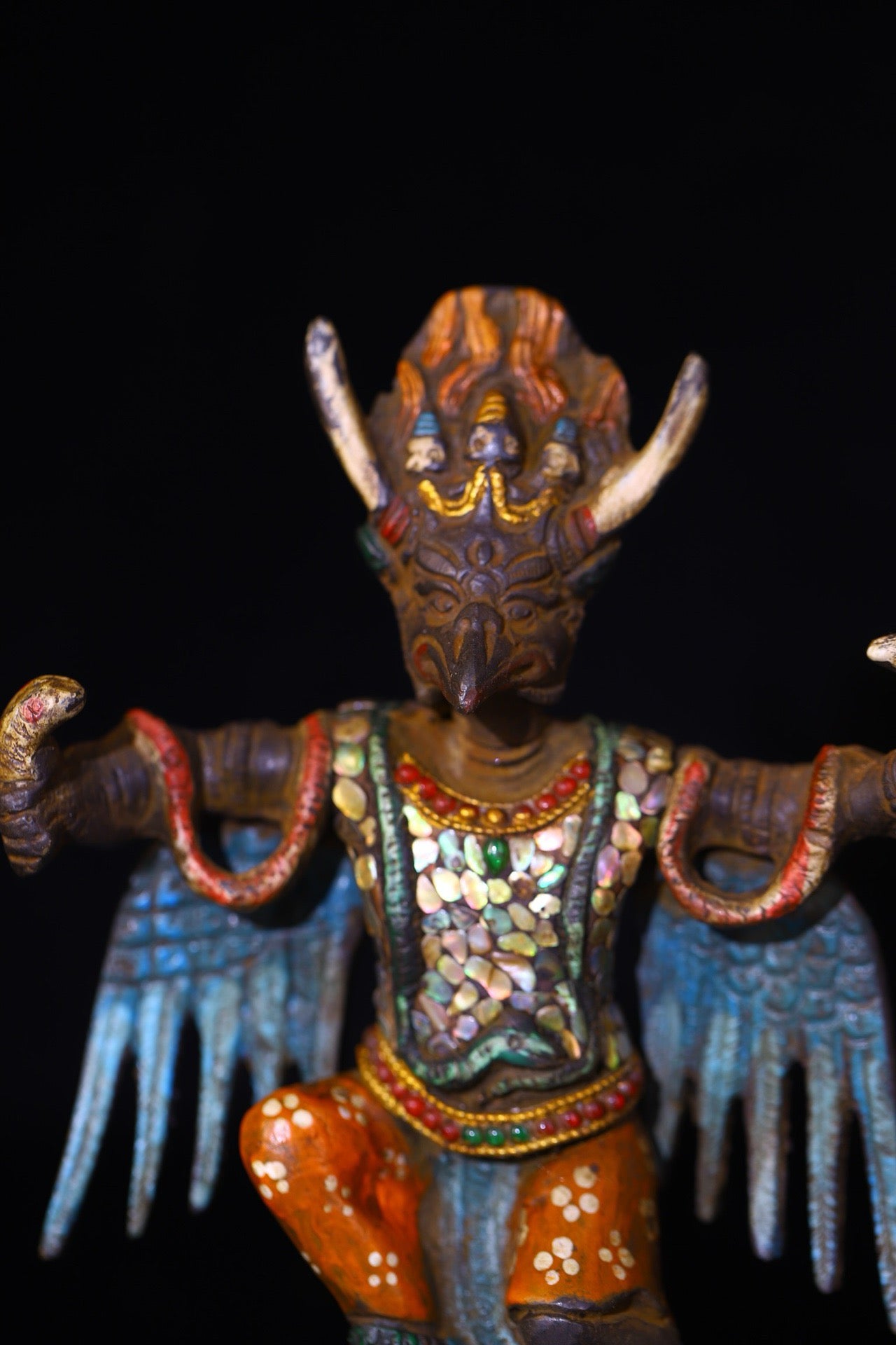 Copper handmade hammering, chiseling and depicting the colorful Dapeng Golden Winged Bird