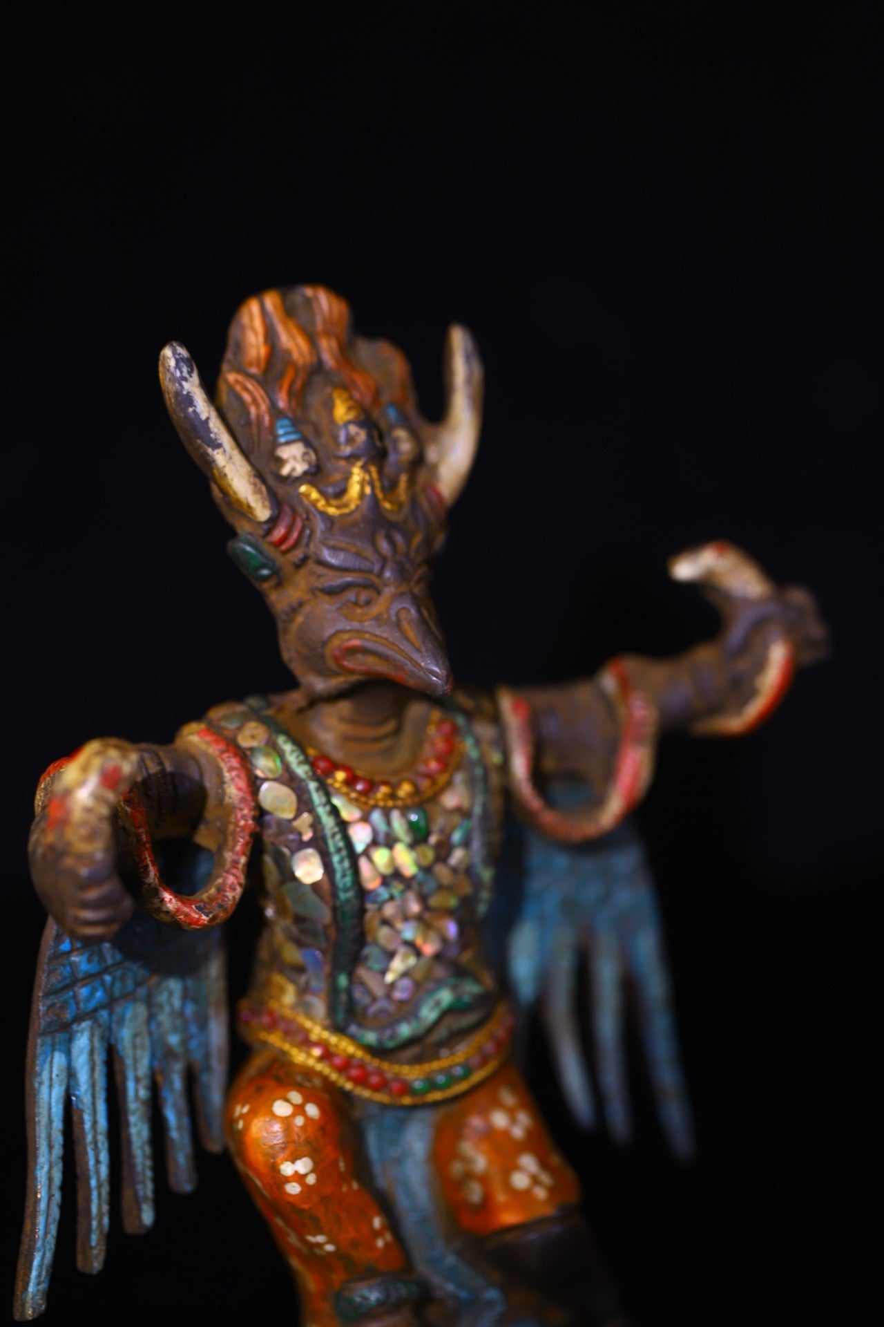 Copper handmade hammering, chiseling and depicting the colorful Dapeng Golden Winged Bird