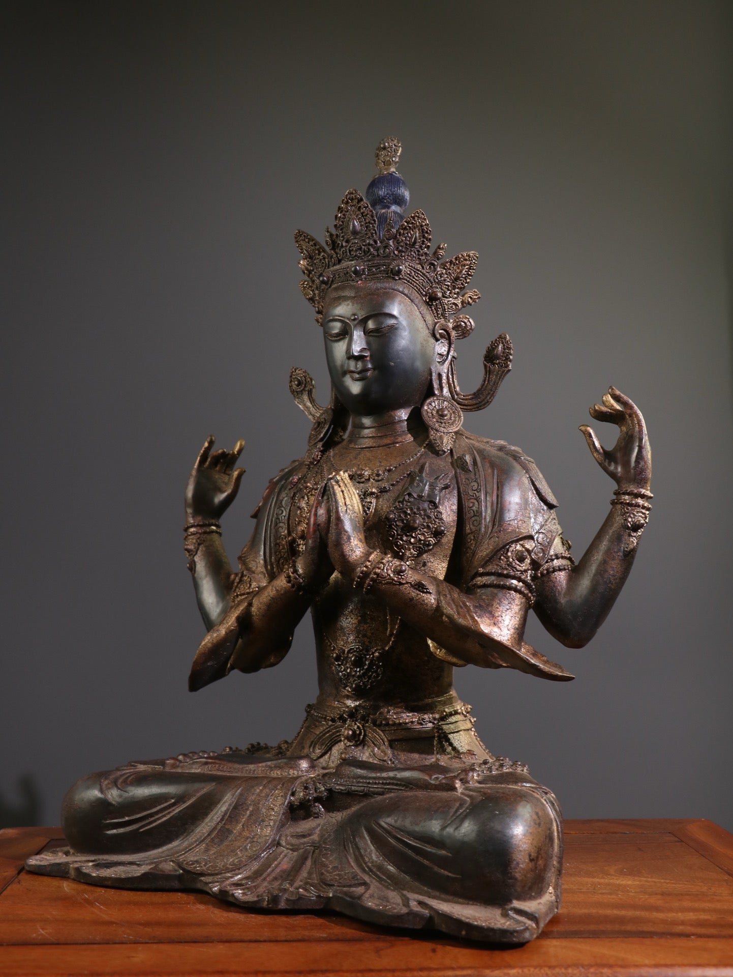 A Chinese antique pure copper statue of Guanyin Bodhisattva with four arms