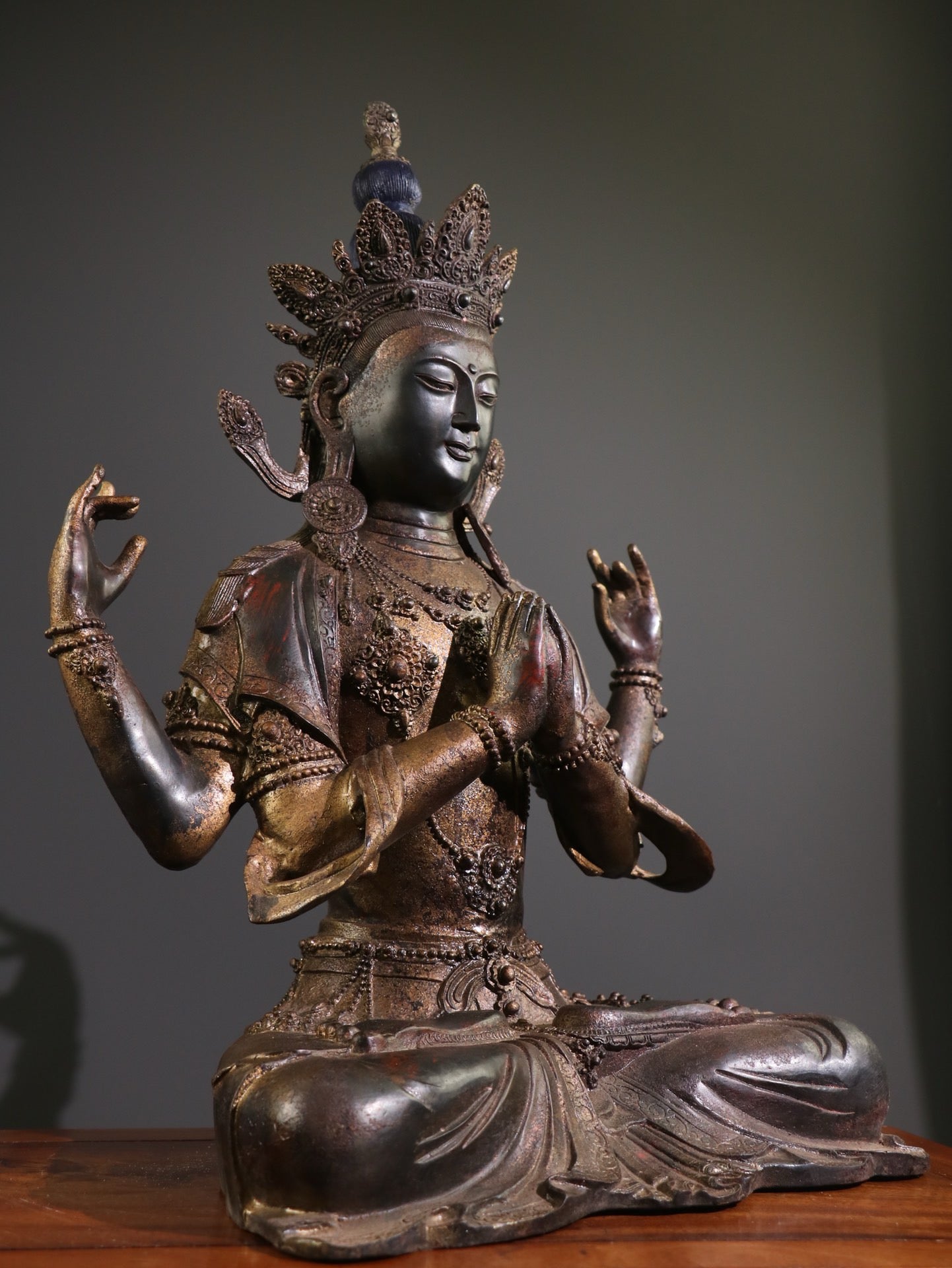 A Chinese antique pure copper statue of Guanyin Bodhisattva with four arms