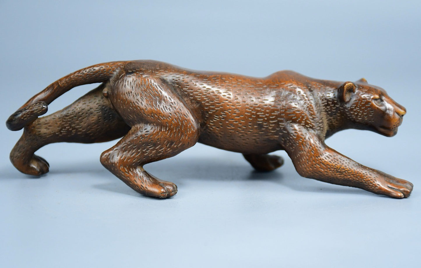 Boutique boxwood leopard ornament