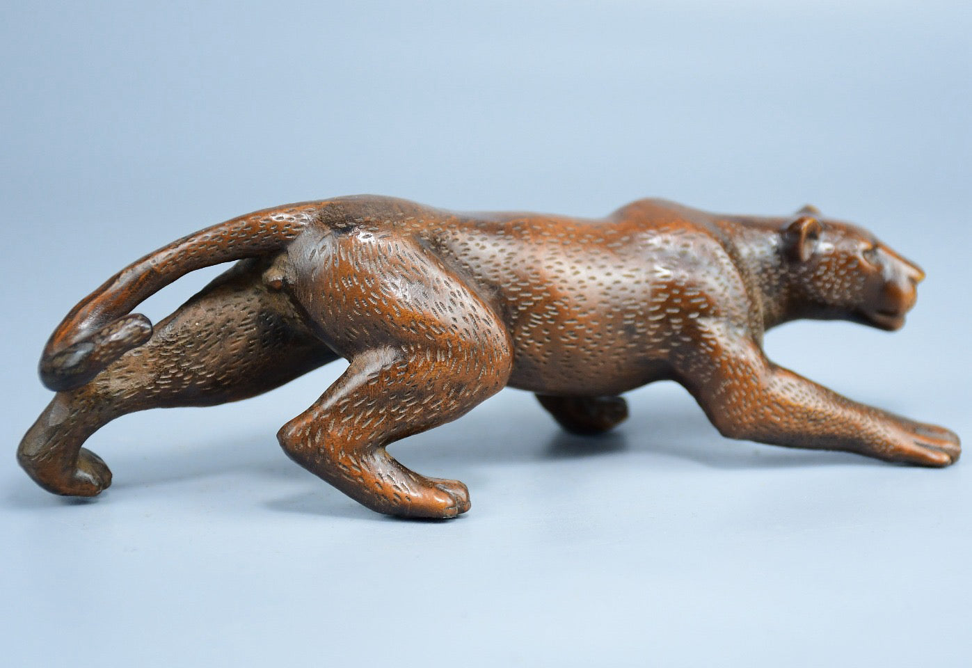 Boutique boxwood leopard ornament