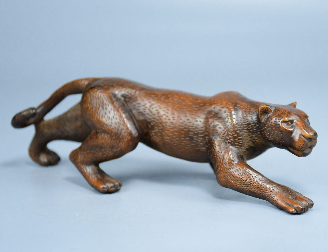 Boutique boxwood leopard ornament