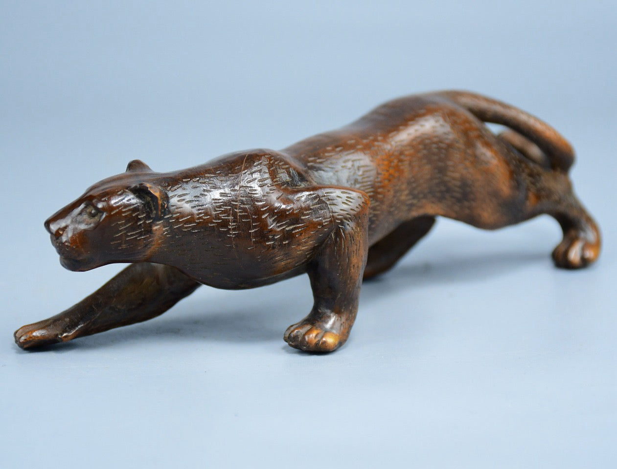 Boutique boxwood leopard ornament