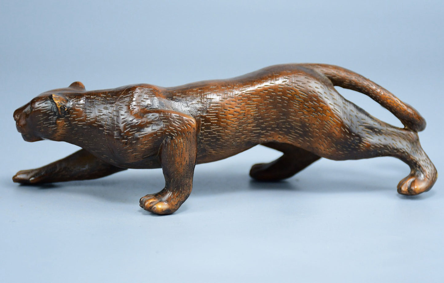 Boutique boxwood leopard ornament