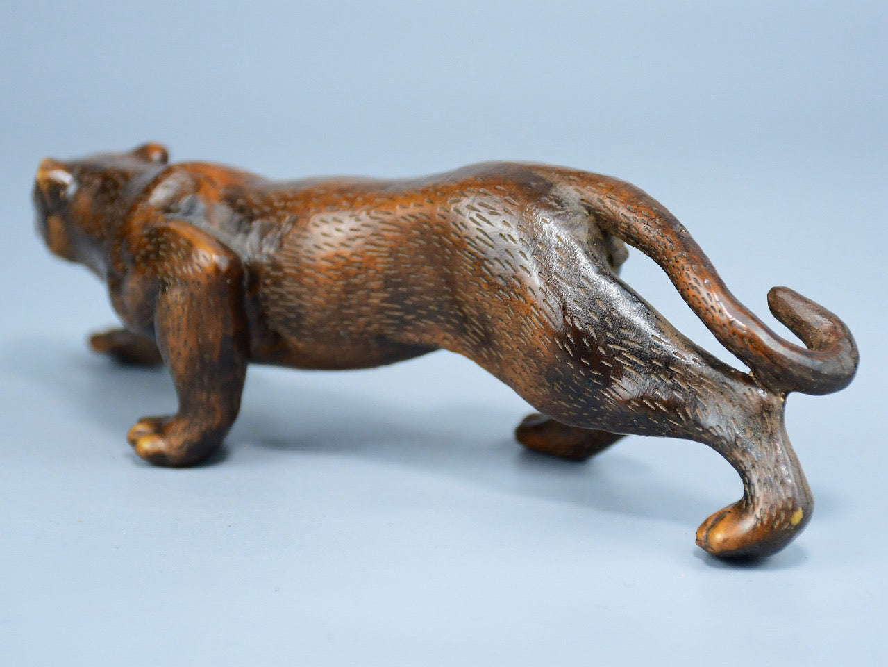 Boutique boxwood leopard ornament