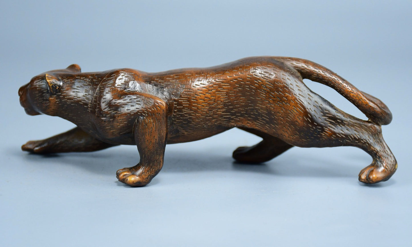 Boutique boxwood leopard ornament