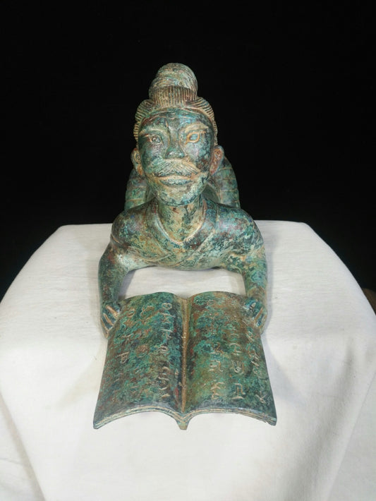 Bronze figurines and figurines lifting books