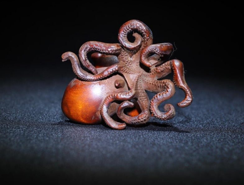 Chinese antique natural boxwood Octopus statue is pure hand carved, precious and exquisite, which is worth collecting