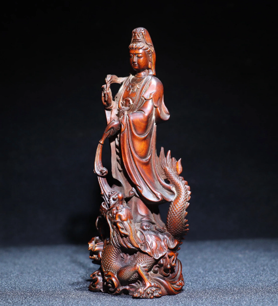 Collection of antique Chinese boxwood dragon Guanyin statues