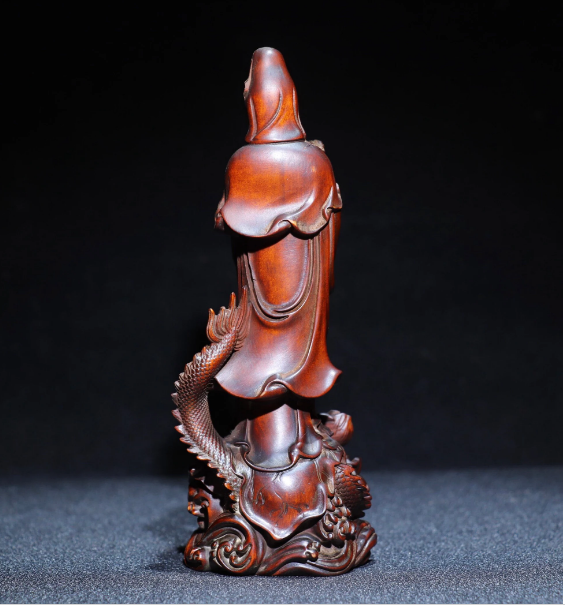 Collection of antique Chinese boxwood dragon Guanyin statues