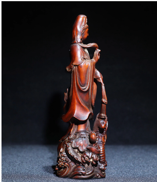 Collection of antique Chinese boxwood dragon Guanyin statues