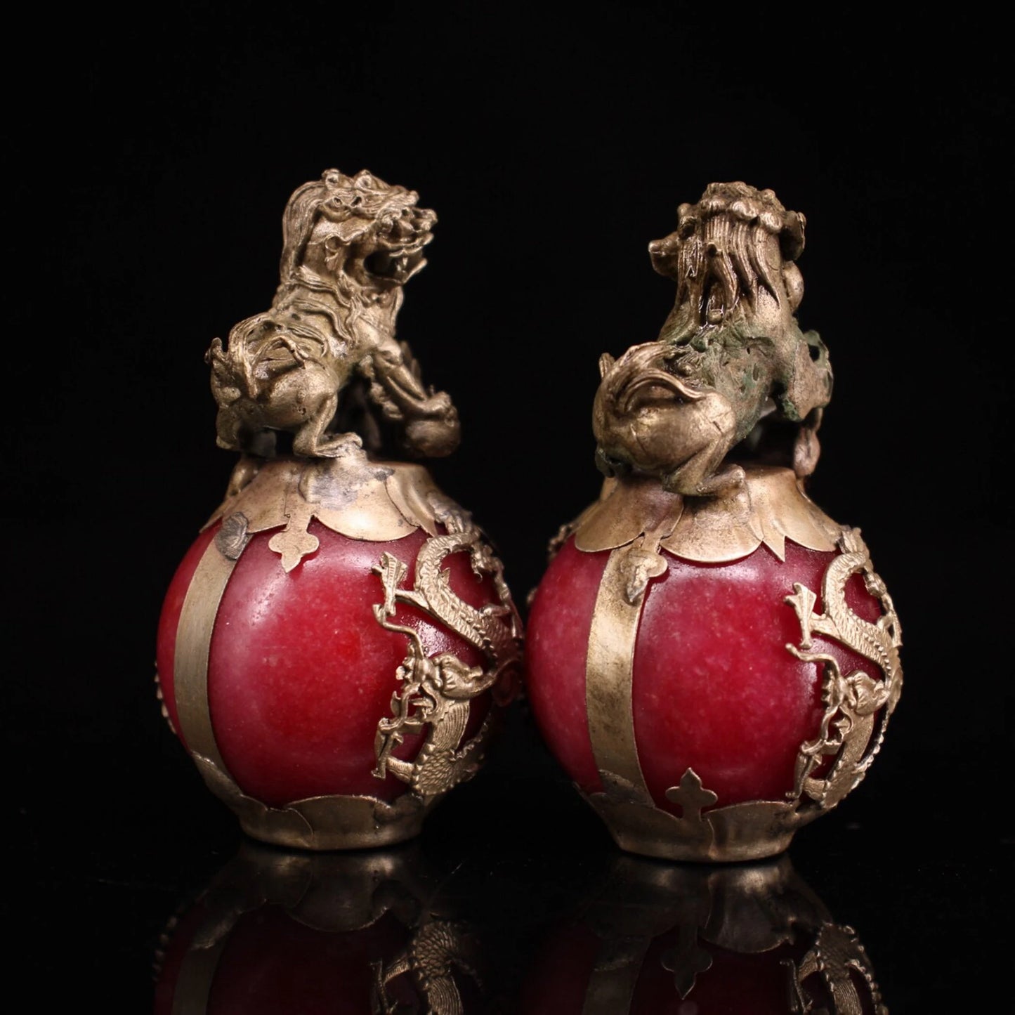 Collection of Chinese antique hand-carved Tibetan silver inlaid jade lion ball